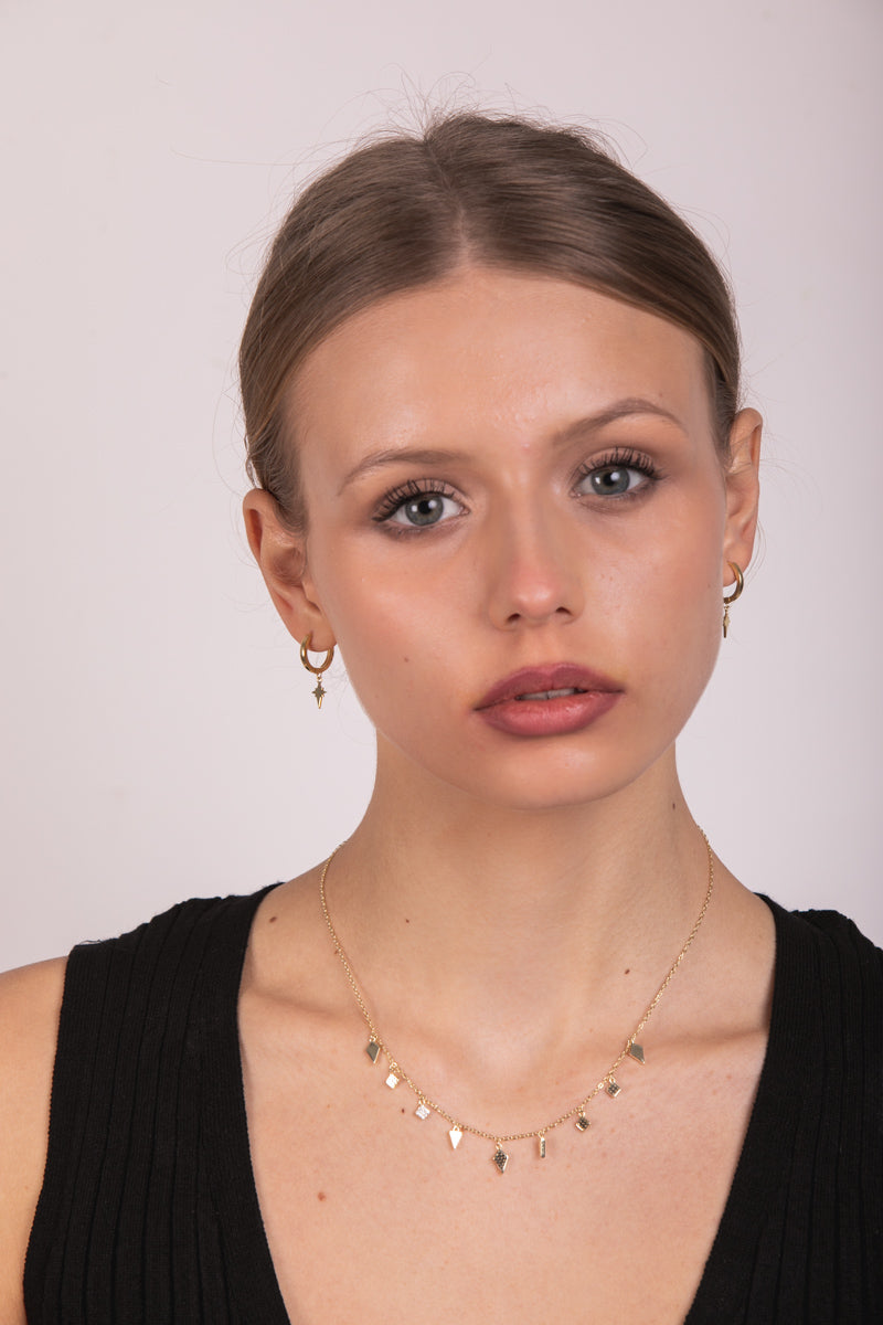 Goldie hoops with elongated star