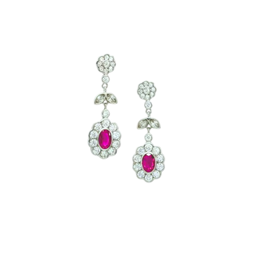 Silver earrings with red circuses.