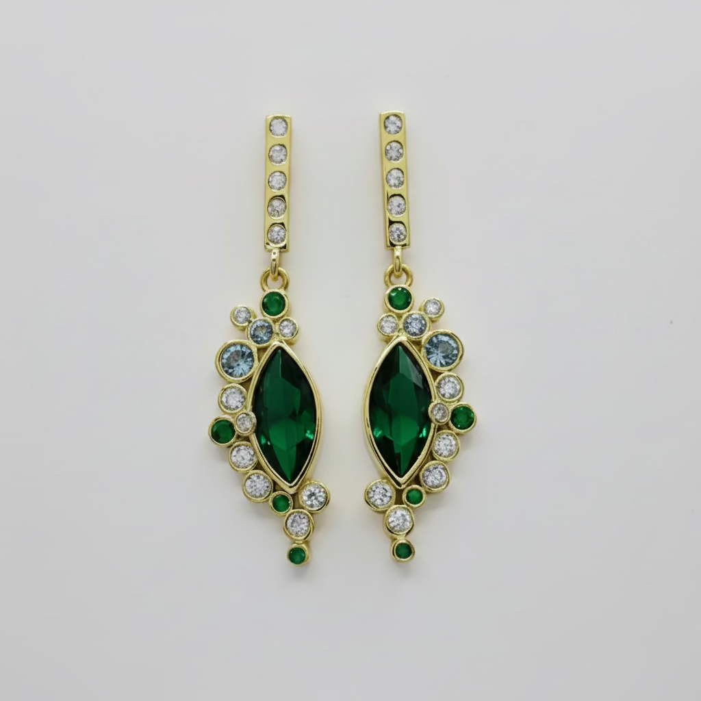 Brincos de prata com círculos verdes.
