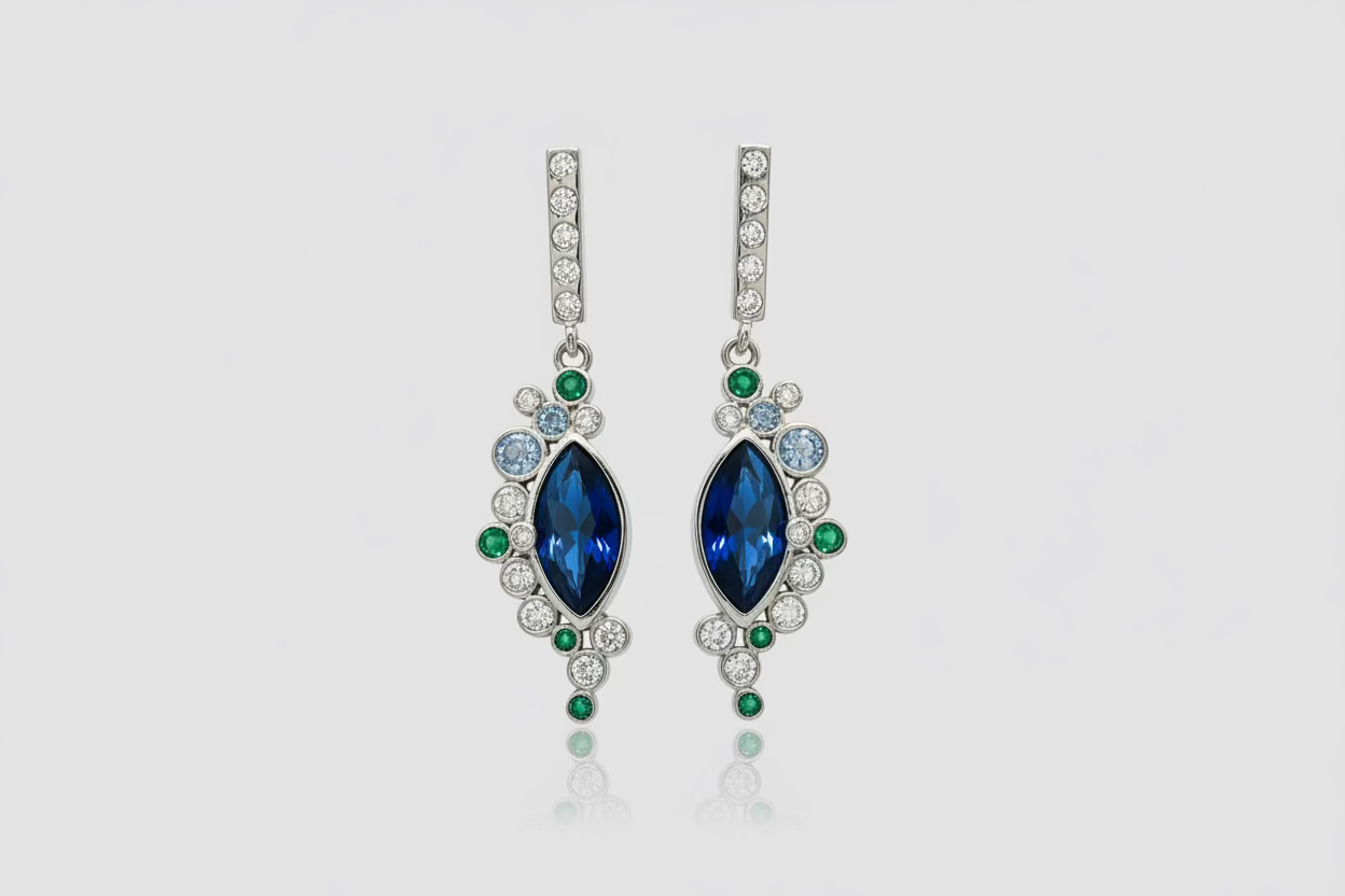 Silver earrings with blue circus stones.