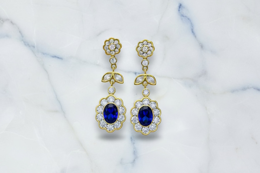 Silver earrings with blue circus stones.