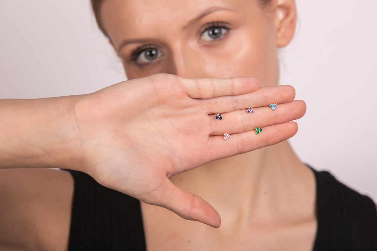 Piercing goldie vários círculos