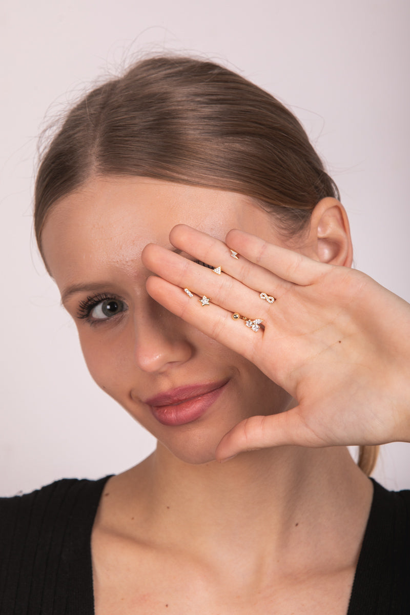 Piercing goldie vários círculos